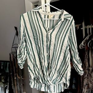 Francesca’s button down twist front top. Size medium.
